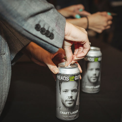 ThriveWell branding on can of craft lager